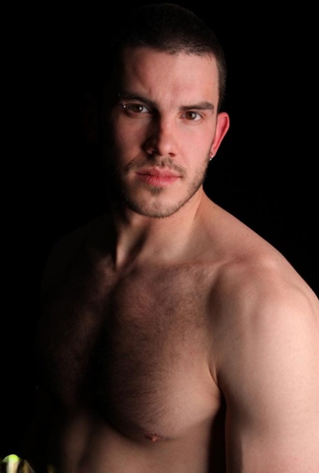 Dark-haired gay model Vander unveils his big hairy dick as he strips