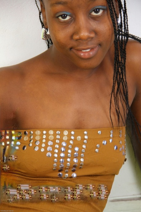 Exotic ebony teen Mistique strips & exposes her big booty and hairy holes