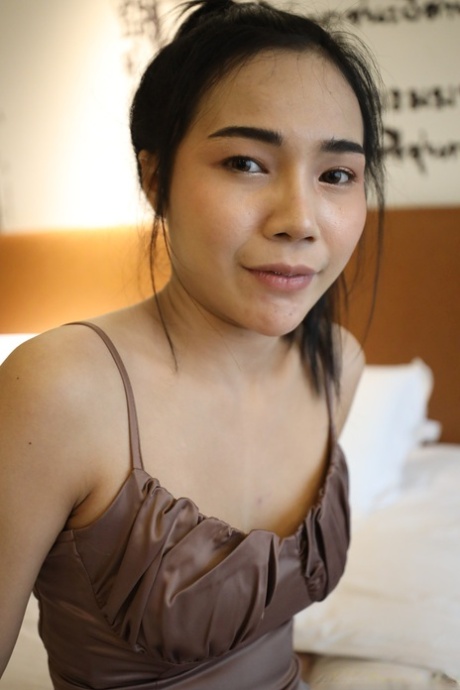 Pretty Asian girl Fern B enjoys some POV hardcore sex in her hotel room